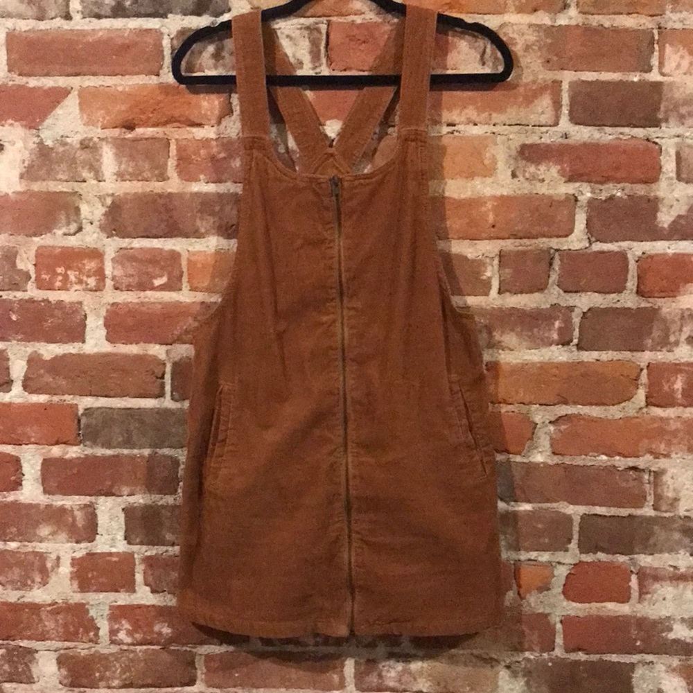 Tan corduroy overalls dress.
